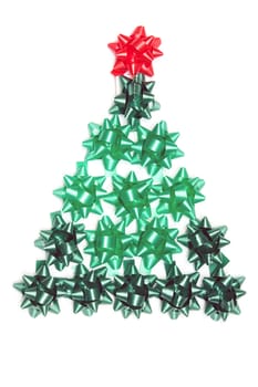 Spruce from green gift ribbon on a white background