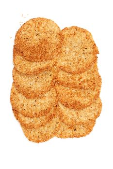 Biscuits with sesame seeds on a white background