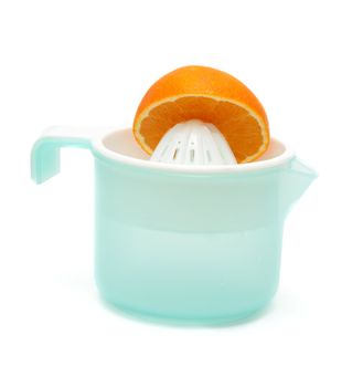 Plastic squeezer for citrus with half of the orange