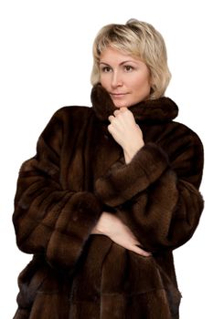 portrait of a beautiful girl in a mink coat on a white background