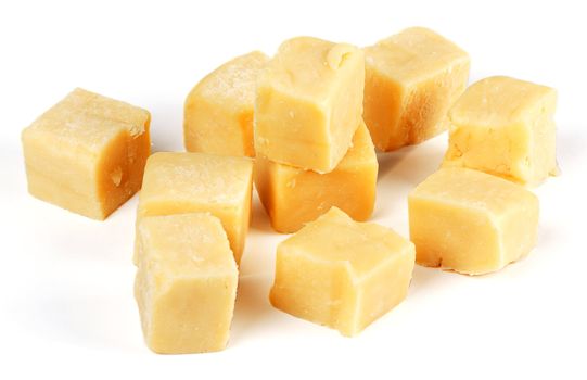 aged cheese, sliced isolated on a white background