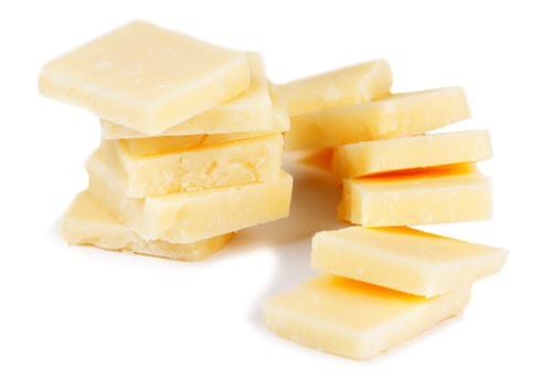 aged cheese, sliced isolated on a white background