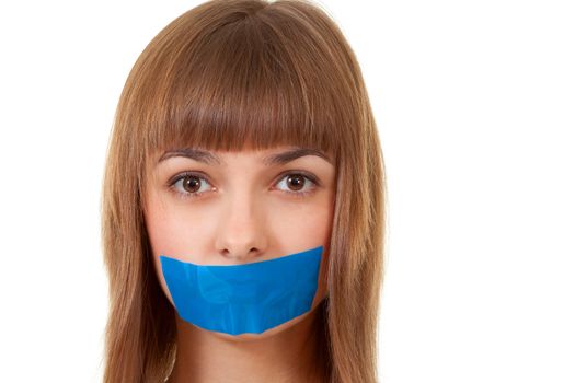 beautiful girl with her mouth sealed with blue tape