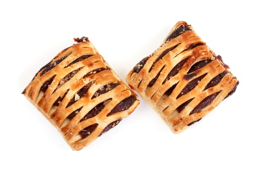 Sweet biscuits and jam on white background