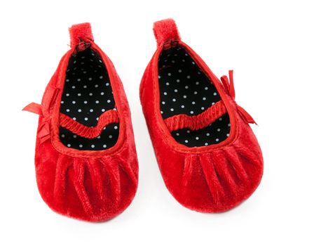 red baby booties isolated on white background