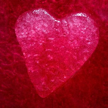 Stock photo: an image of a red heart on purple background