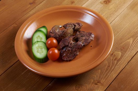 Chicken livers and vegetable.closeup