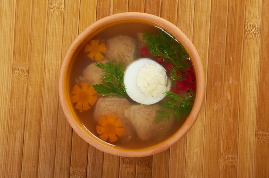 Aspic from meat decorated with egg, carrot,