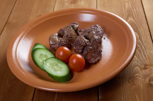 Chicken livers and vegetable.closeup