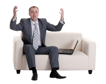 businessman on the couch with a laptop