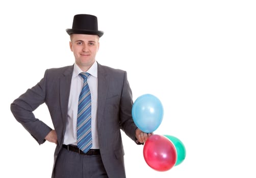 businessman in a black hat with inflatable colored balls