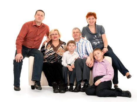 Three generations of a family sitting on the couch