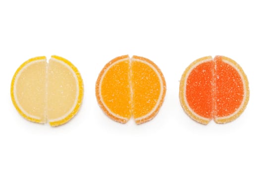 Three round jelly candy on a white background
