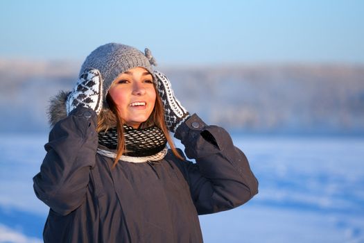 portrait of a young beautiful girl in the cold
