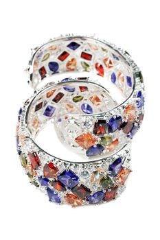 silver bracelet with stones on a white background