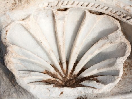 Carved patterns in the old white marble