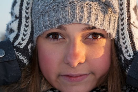 portrait of a beautiful girl close up in winter