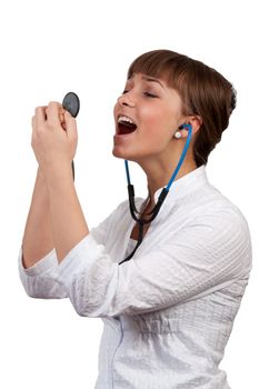 beautiful young woman doctor with a stethoscope sings on a white background