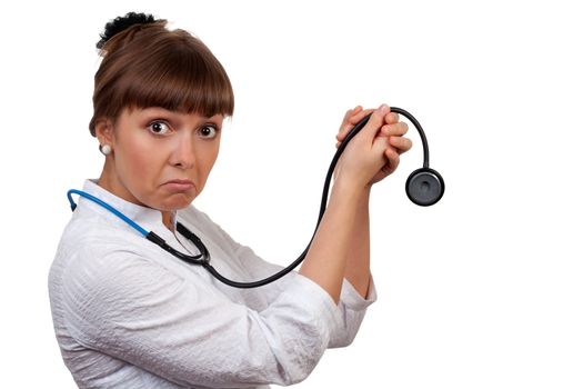 beautiful young woman doctor with a stethoscope sings on a white background