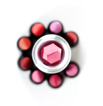 Female red lipstick on a white background