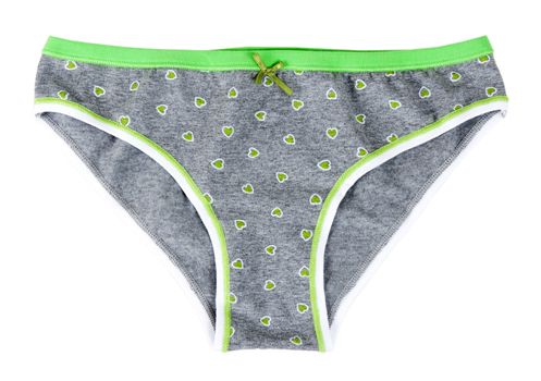 Gray pants with patterns in the form of green hearts on a white background