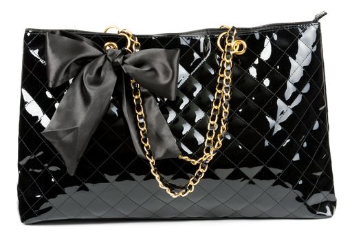 black glossy women's handbag isolated on a white background