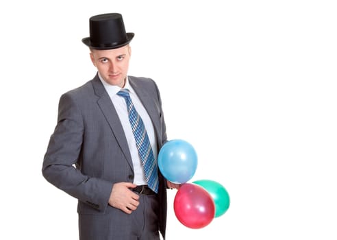 businessman in a black hat with inflatable colored balls