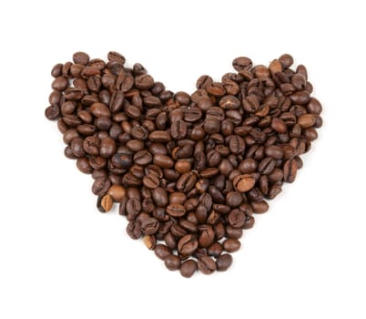 beans ulodennye in shape of heart on a white background