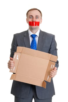 Businessman separates the red tape from his mouth