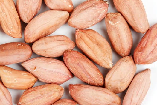 background as spilling peanut on a light background