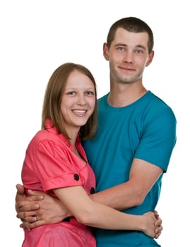 young couple in colored dress with a white background