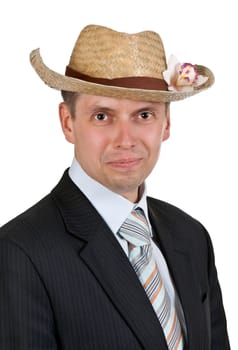 Handsome businessman with a straw hat with an orchid on a white background