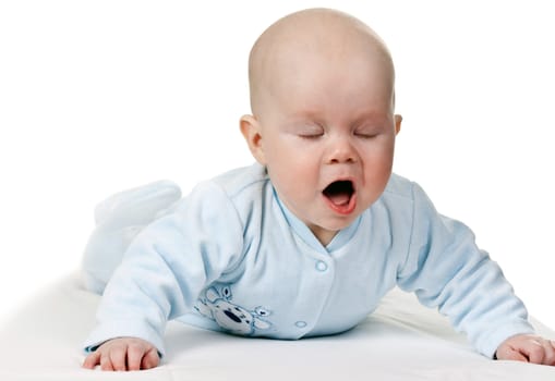 portrait of a baby, happy with his mouth open and eyes closed on a white background
