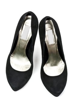 pair of black suede women's high heel shoes isolated on white background