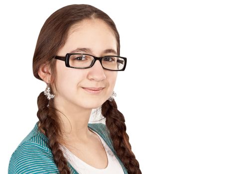 Teen girl with pigtails wearing glasses on a white background