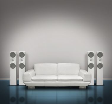 Blue and white listenings room with white speakers and sofa