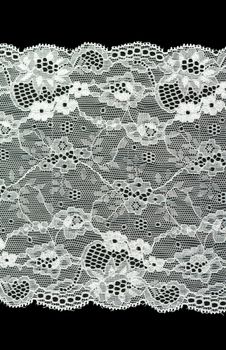 White lace with pattern with form flower on black background