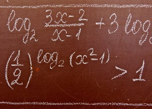 mathematical formulas on the blackboard brown