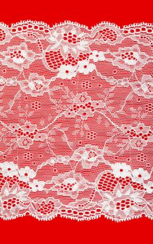 White lace with pattern rose flowerses on red background