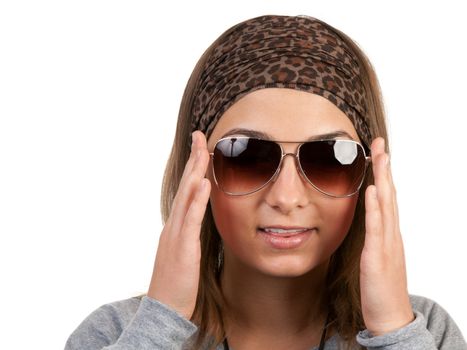 portrait of a girl with glasses in a leopard scarf on a white background
