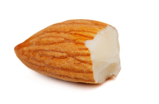 half of fresh almonds isolated on a white background
