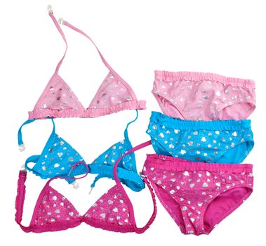 three colored children's swimsuit with patterns in the shape of a heart on a white background