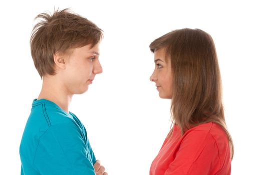 pair of teenagers looked at each other on a white background