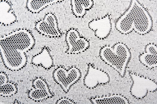 white lace patterned with hearts background