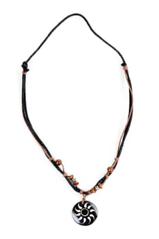 ethnic necklace with black cord isolated on white background