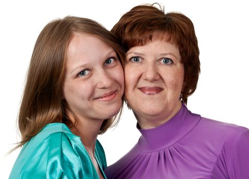 portrait of a middle-aged mother with a young daughter on a white background