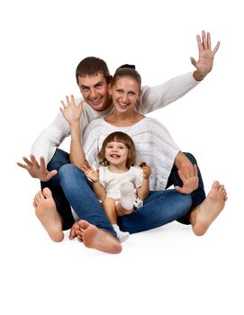 father, mother, daughter, sitting in the studio on a white background