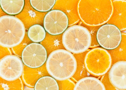 background of the slices of orange lemon lime