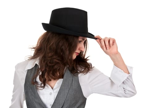 portrait of a beautiful girl in a black hat in profile on a white background