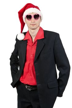 businessman in the Santa hat and sunglasses on a white background